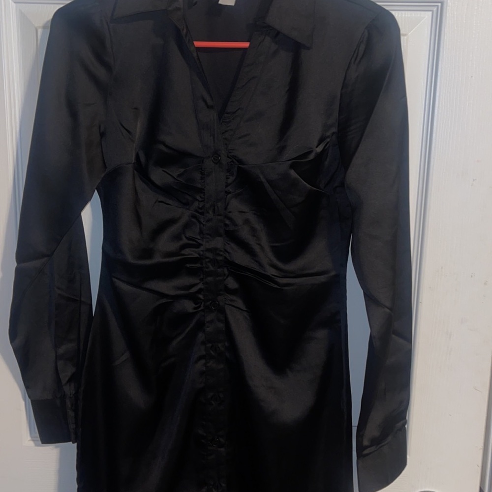 Black size S woman’s blouse dress—midi length